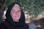 Krista - Smiling old greek woman in black robes